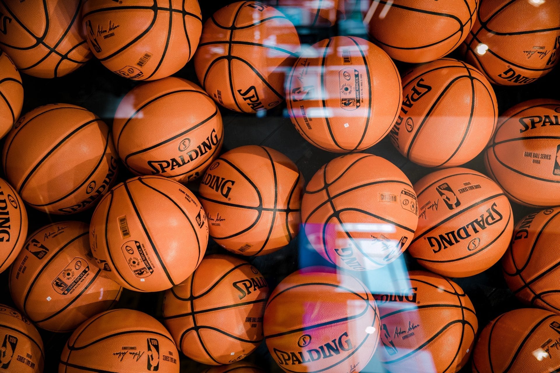 Image of many basketballs.