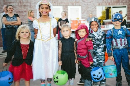 A photo of children dressed up in costumes.