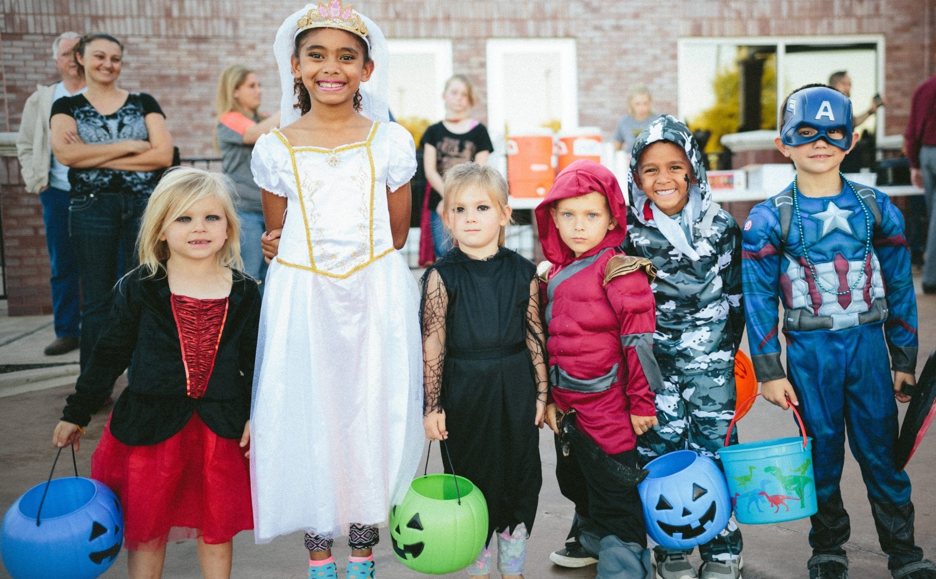 A photo of children dressed up in costumes.