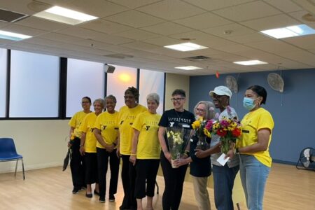 Group of people in yellow shirts