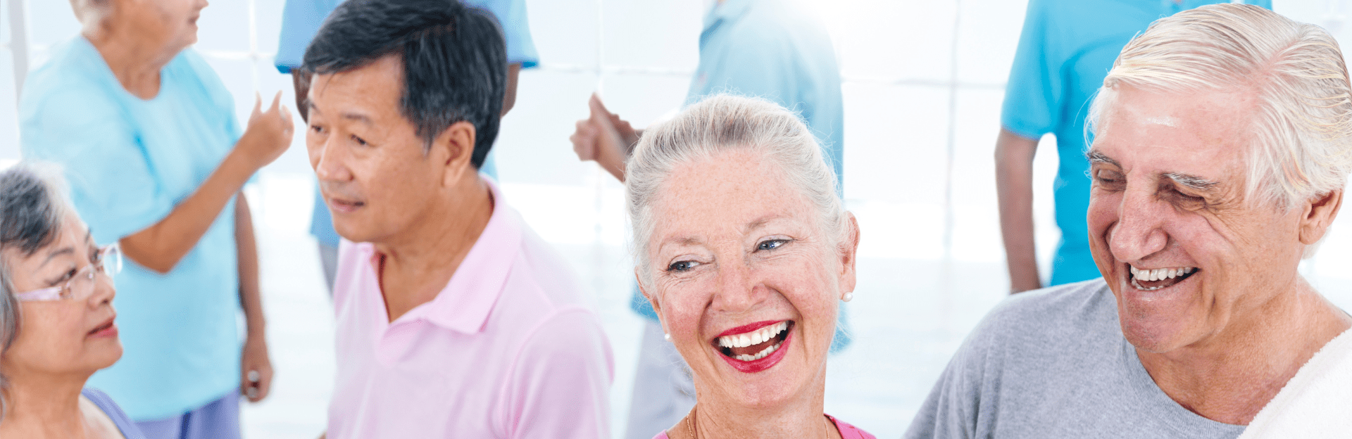 Group of smiling seniors socializing together