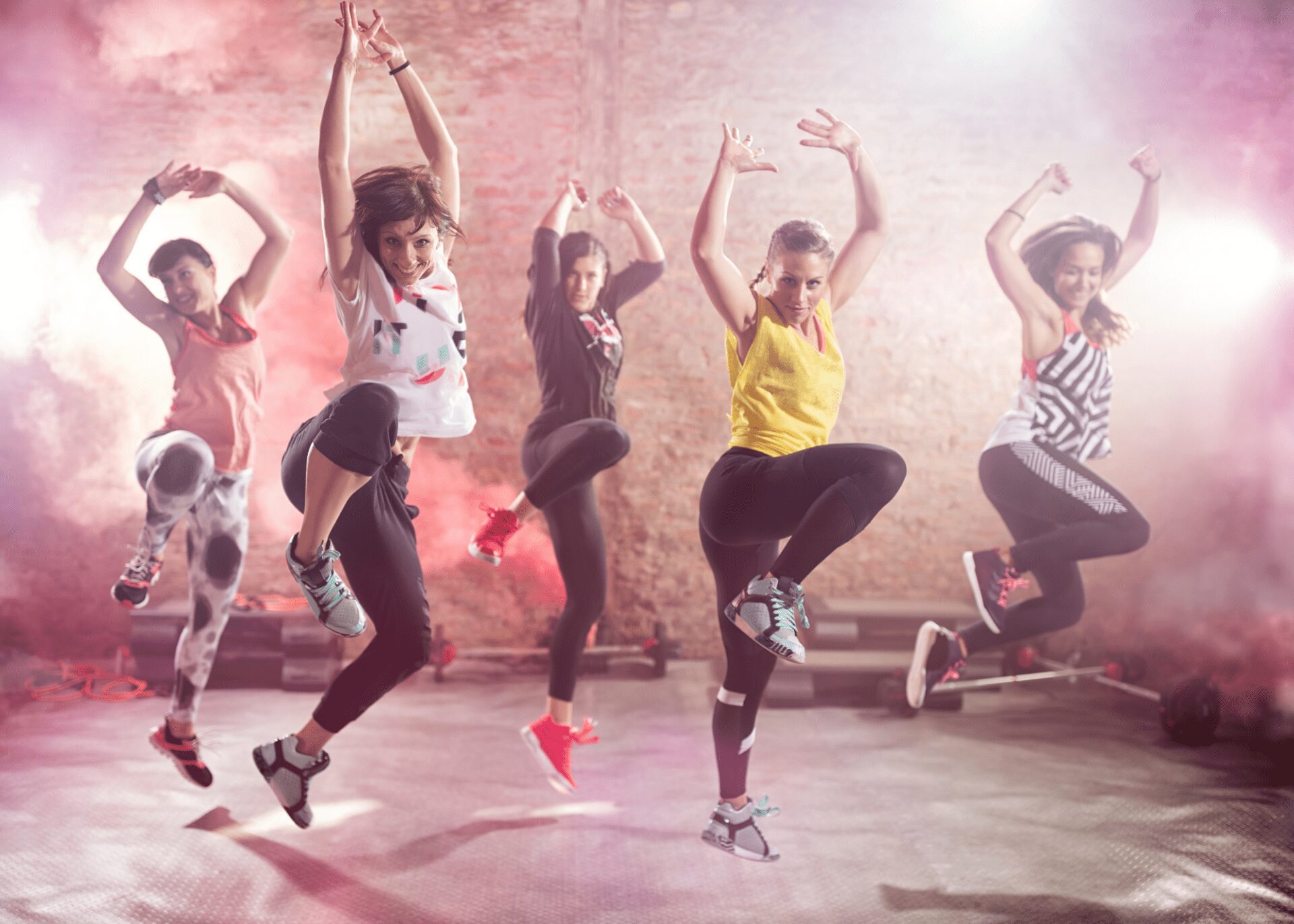 Group of women dancing energetically